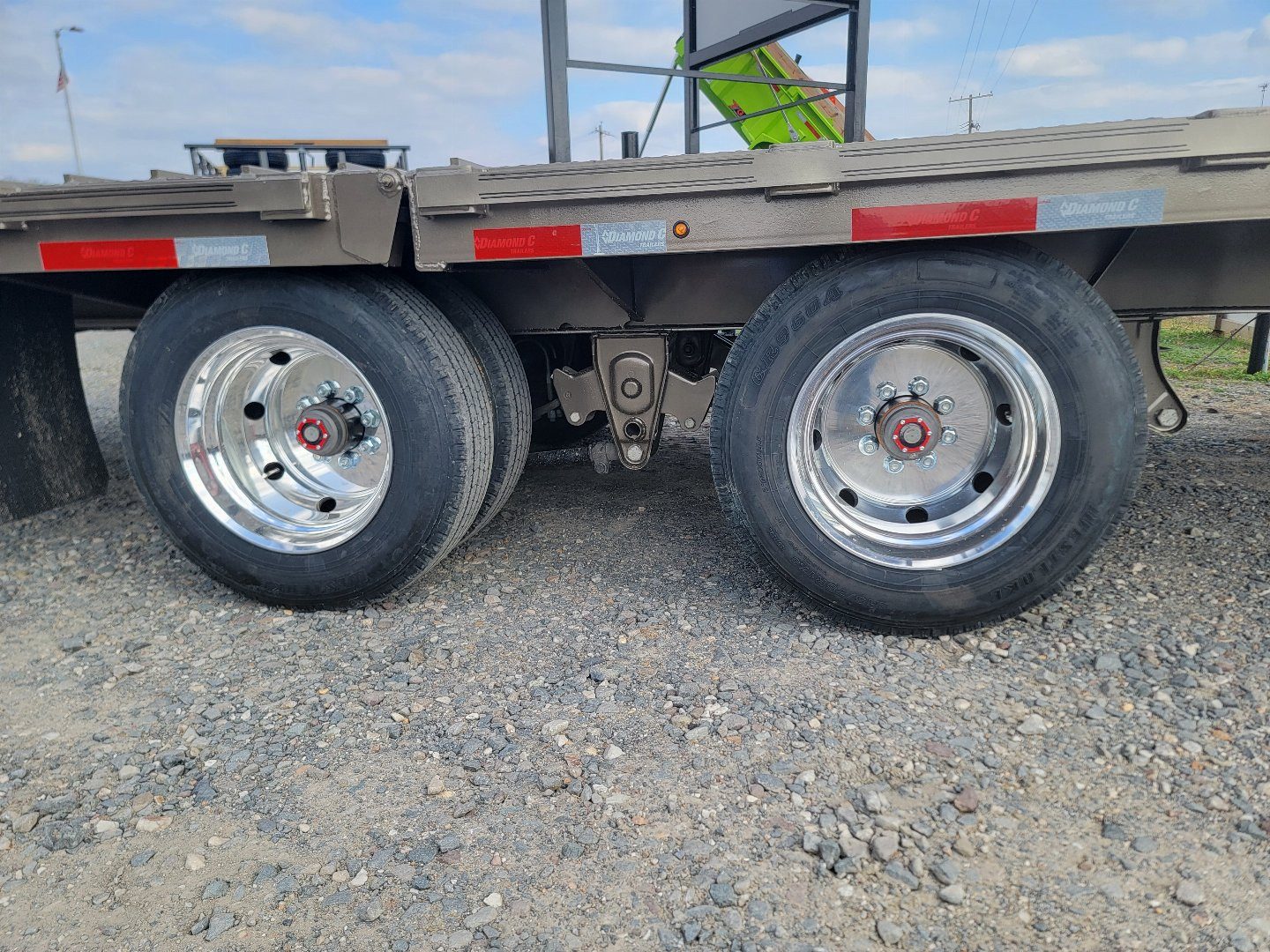 New 2025 Diamond C Trailers FMAX212 32' x 102" Hydraulic Dovetail Pacesetter Edition