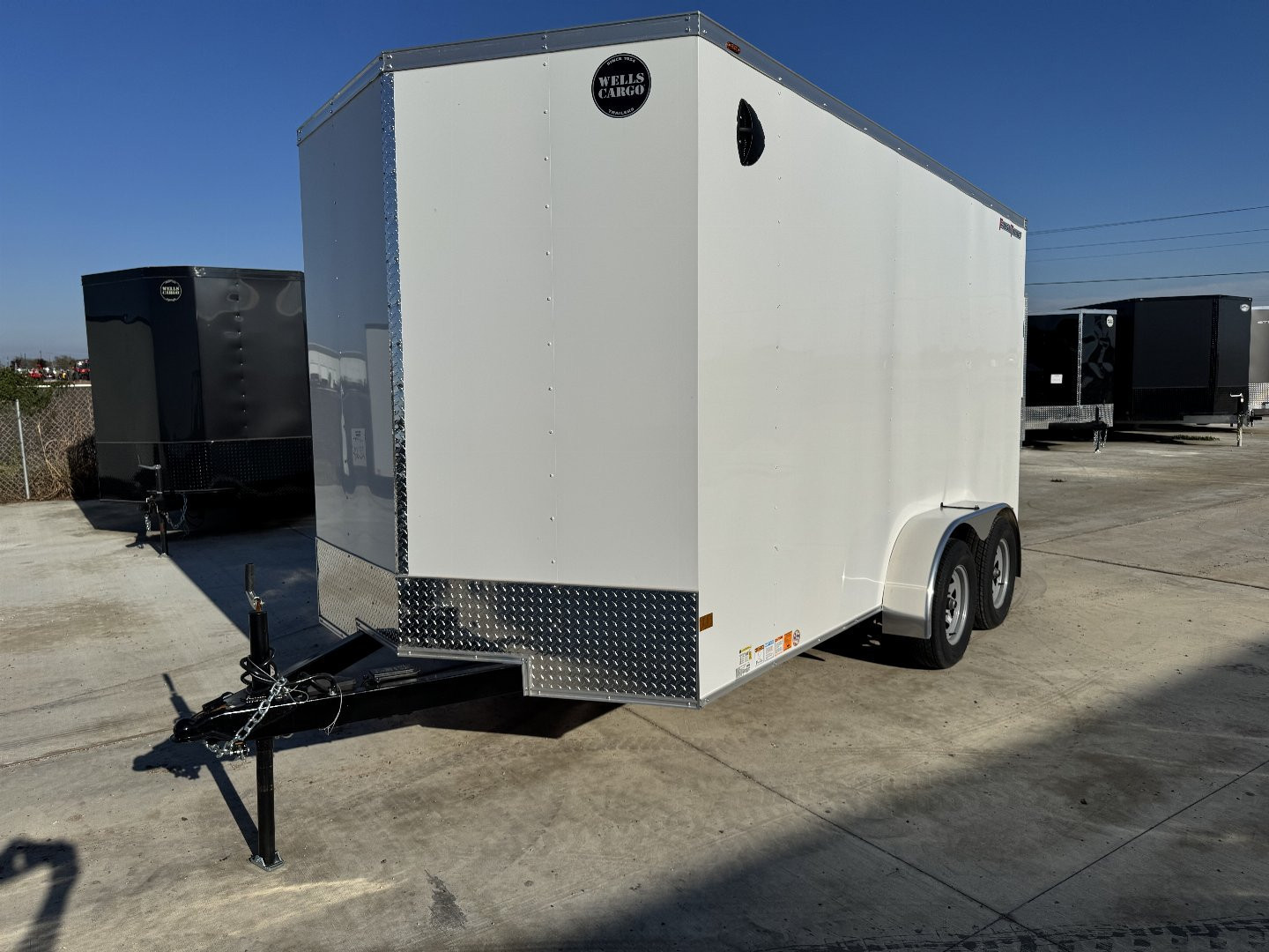 New 2025 Wells Cargo 7X14 RAMP DOOR 7K Enclosed