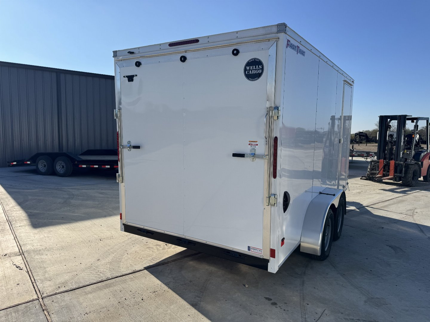 New 2025 Wells Cargo 7X14 RAMP DOOR 7K Enclosed
