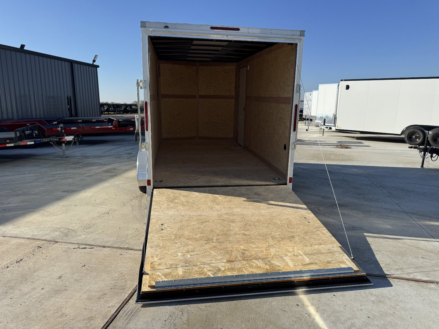 New 2025 Wells Cargo 7X14 RAMP DOOR 7K Enclosed