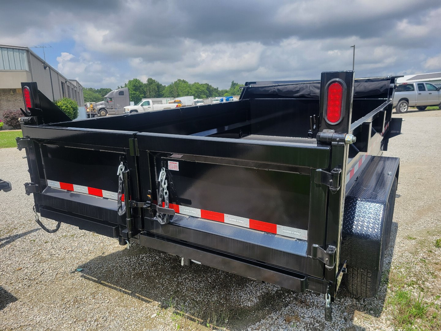 New 2025 Sure-Trac 82x12 HD Low Profile Dump Trailer