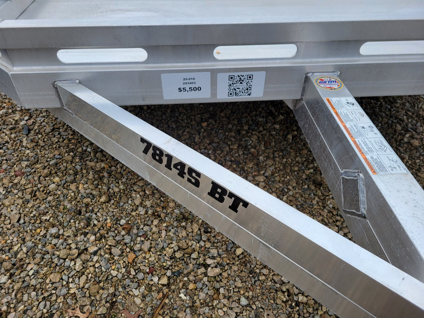 New 2026 Aluma 7814 Single Axle Bi-Fold Tailgate Slotted Rail Utility Trailer