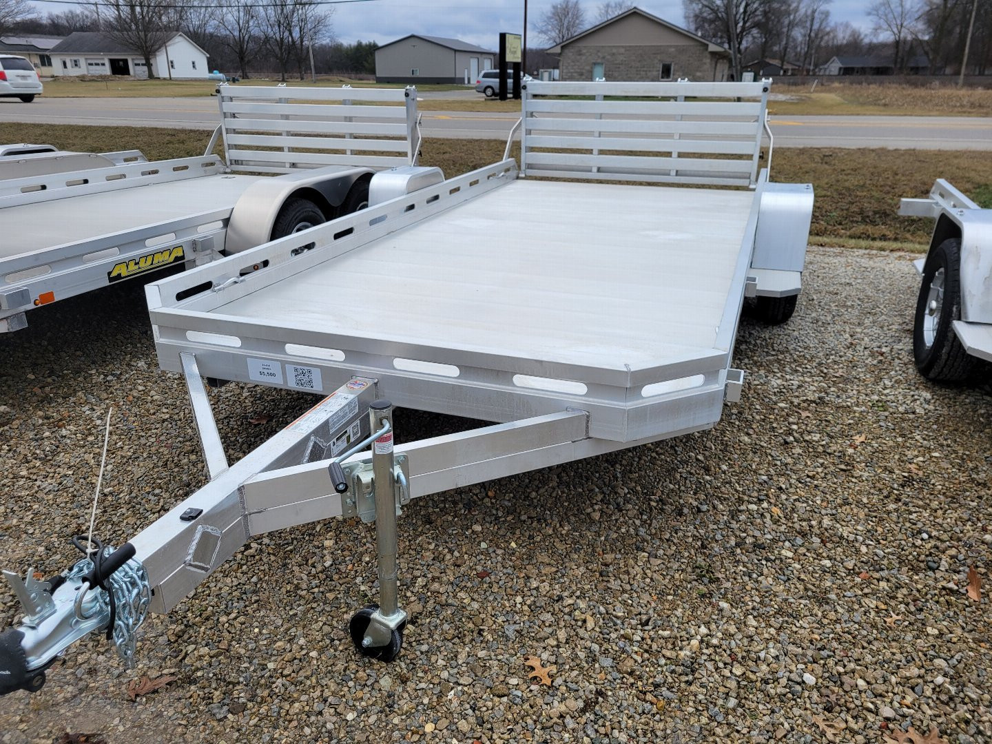 New 2026 Aluma 7814 Single Axle Bi-Fold Tailgate Slotted Rail Utility Trailer