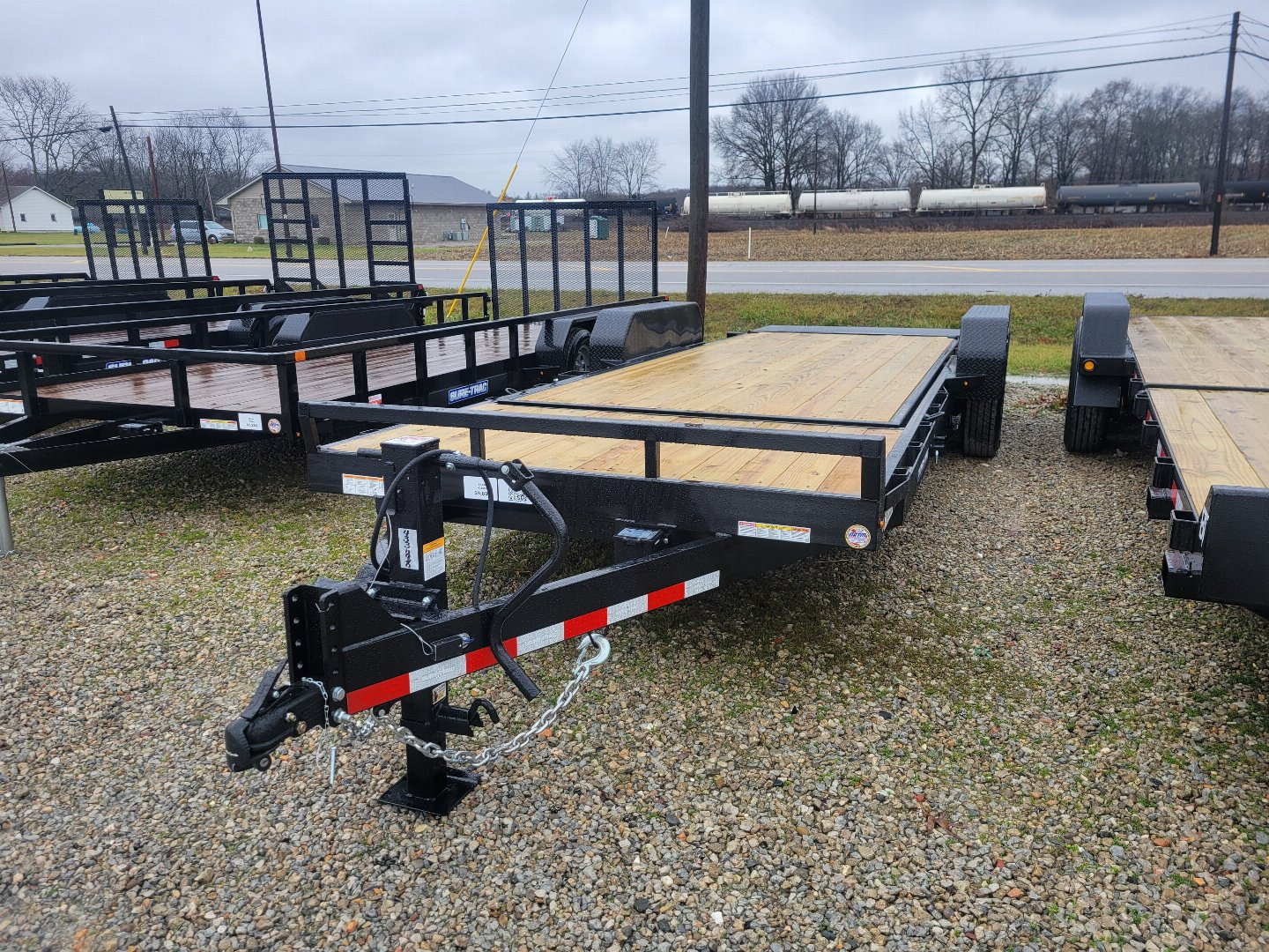 New 2025 Sure-Trac 7x18+4 Tilt Bed Equipment Trailer