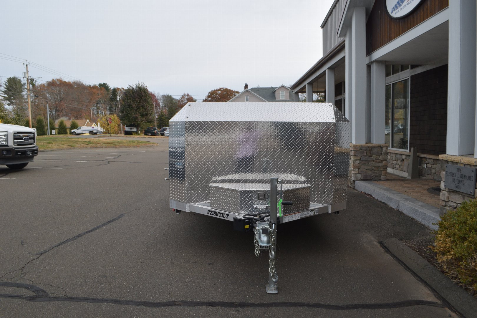 New ALUMA 6’9″ X 18′ OPEN CAR HAULER TILT 25TH ANNIVERSARY TRAILER 9.9K