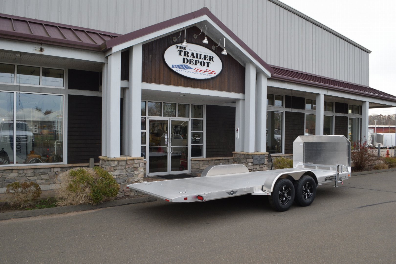 New ALUMA 6’9″ X 18′ OPEN CAR HAULER TILT 25TH ANNIVERSARY TRAILER 9.9K