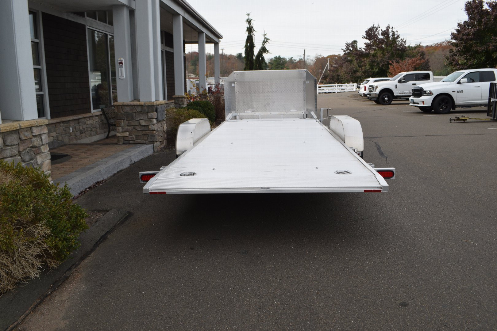 New ALUMA 6’9″ X 18′ OPEN CAR HAULER TILT 25TH ANNIVERSARY TRAILER 9.9K