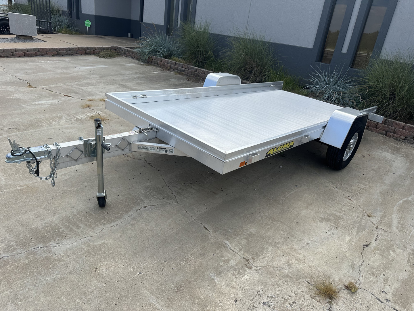 New 2023 Aluma 6812HTILT Utility Trailer
