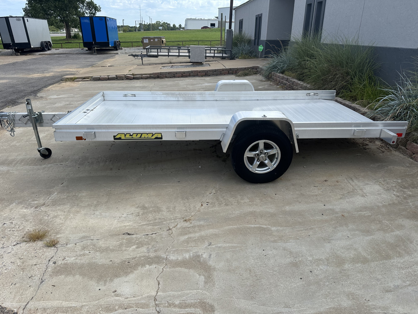 New 2023 Aluma 6812HTILT Utility Trailer