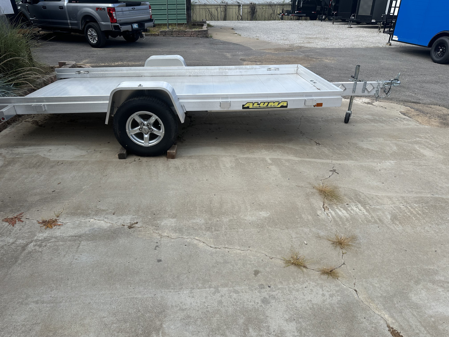 New 2023 Aluma 6812HTILT Utility Trailer