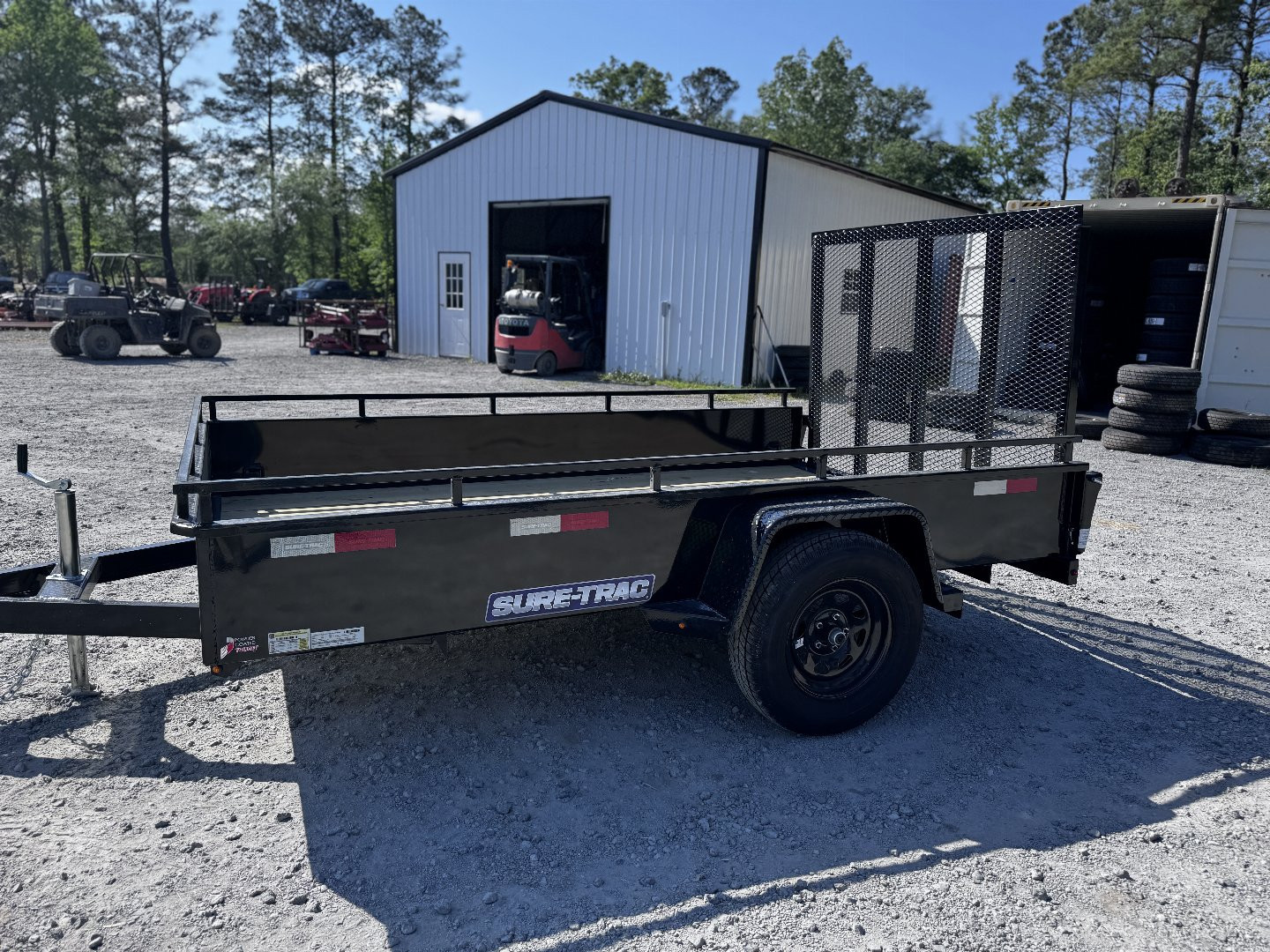 New 2025 Sure-Trac 6X10 STEEL HIGH SIDE UTILITY 3K	 STUSH7210-BP-030 Utility Trailer