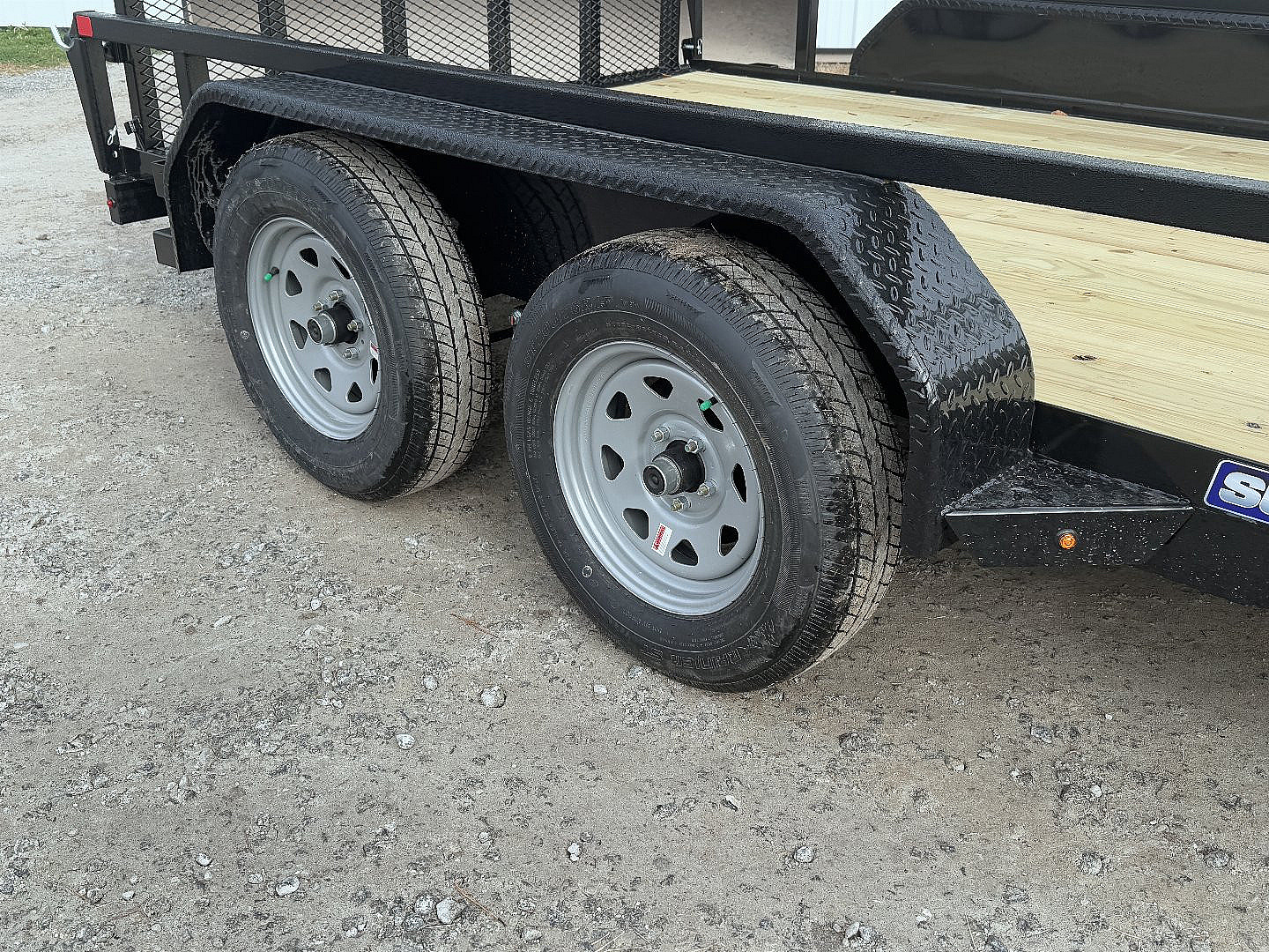 New 2025 Sure-Trac 82"x12' Tandem Axel Utility Trailer