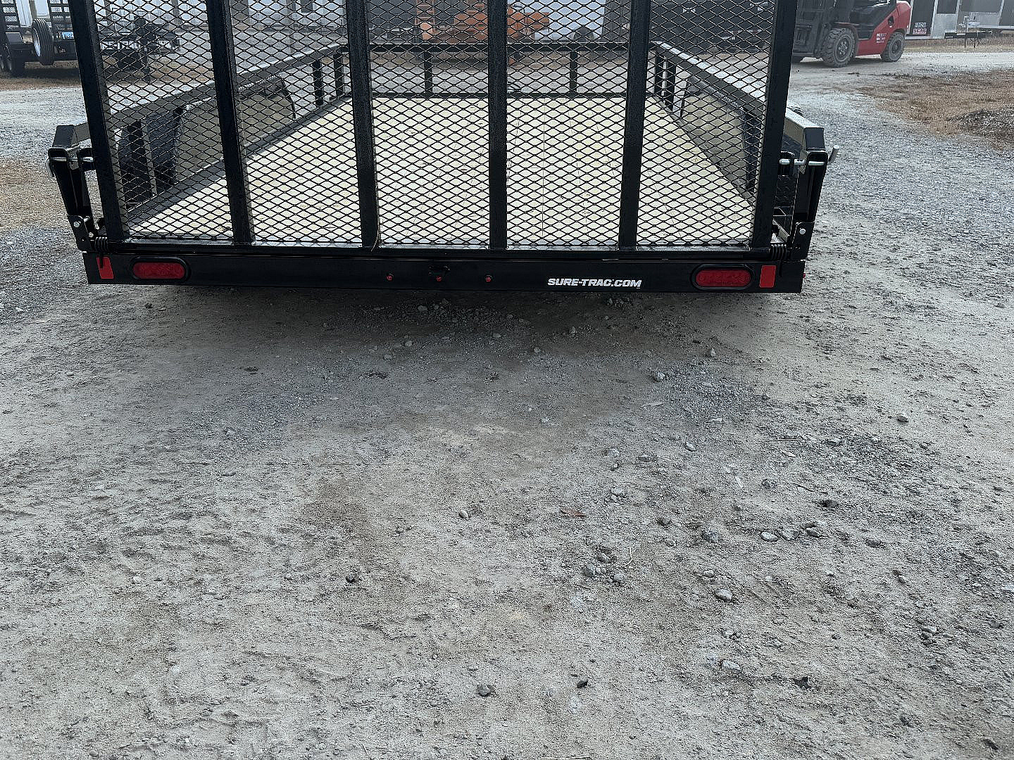 New 2025 Sure-Trac 82"x12' Tandem Axel Utility Trailer