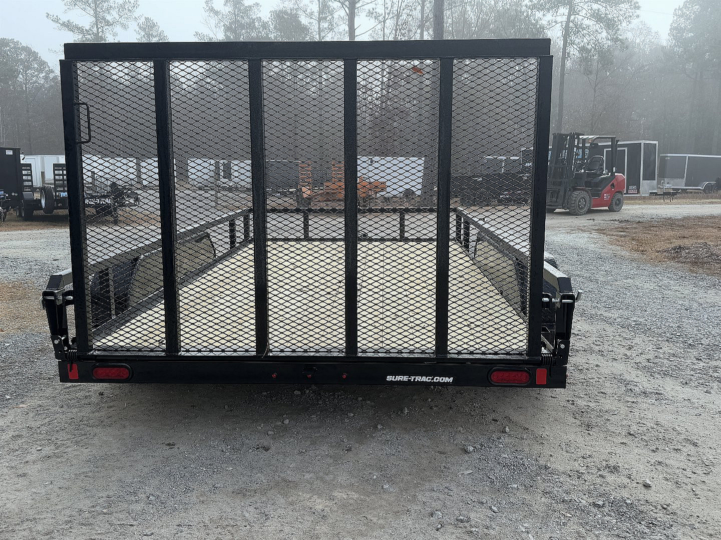 New 2025 Sure-Trac 82"x12' Tandem Axel Utility Trailer