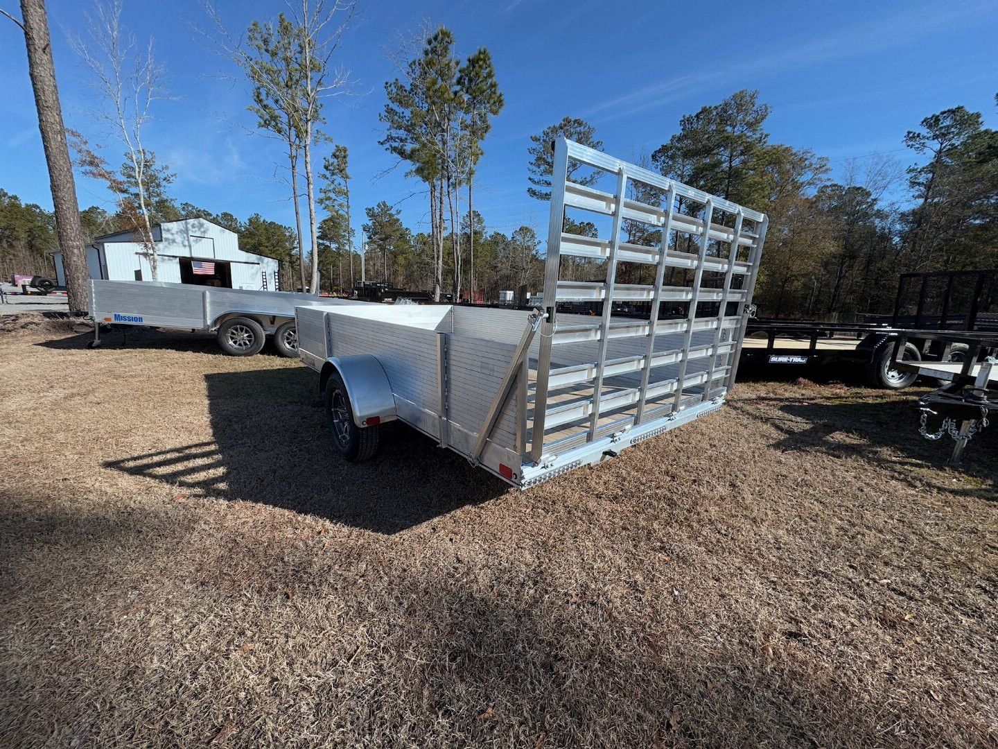 New 2025 Mission 80"x12' Solid High Sided Utility Trailer