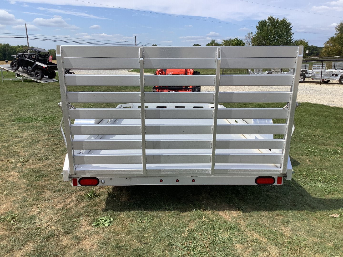 New 2025 ALUMA 7712H-S-TG Utility Trailer