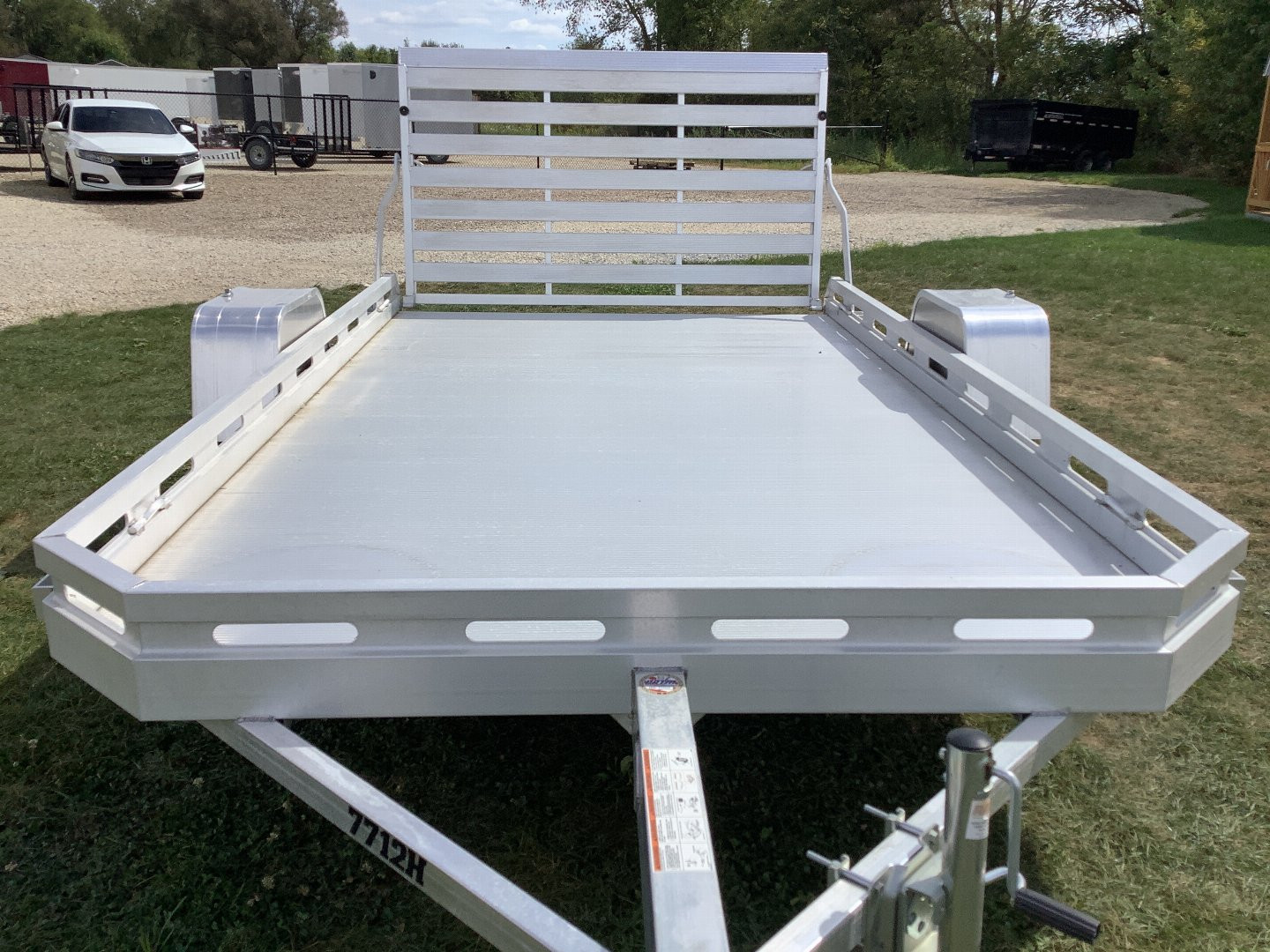 New 2025 ALUMA 7712H-S-TG Utility Trailer