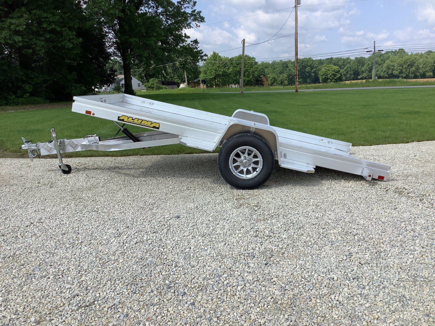 New 2024 Aluma 6812H-TILT Utility Trailer
