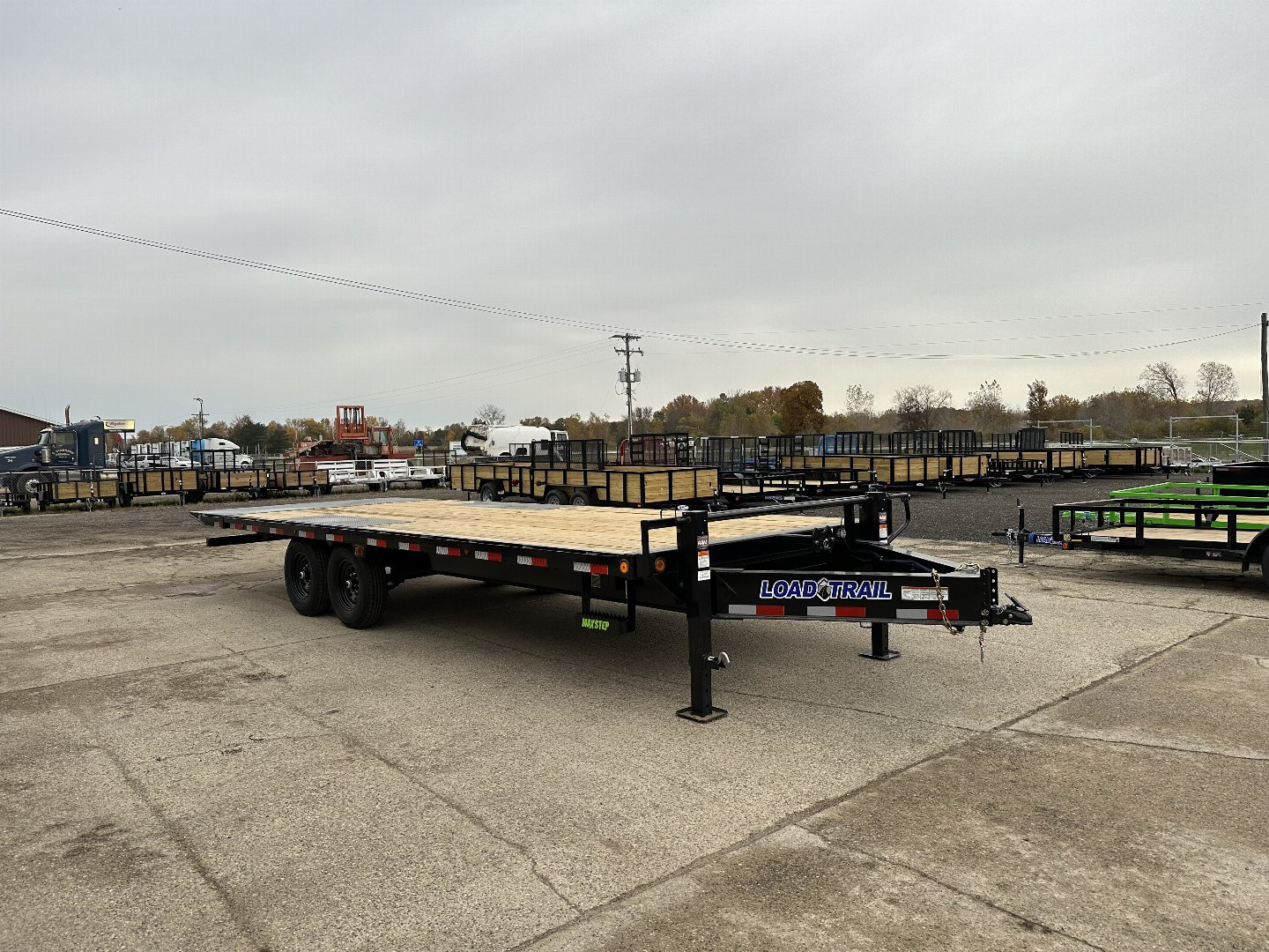 New 2025 Load Trail 102"X24' 16k Full Deck Power Tilt Trailer