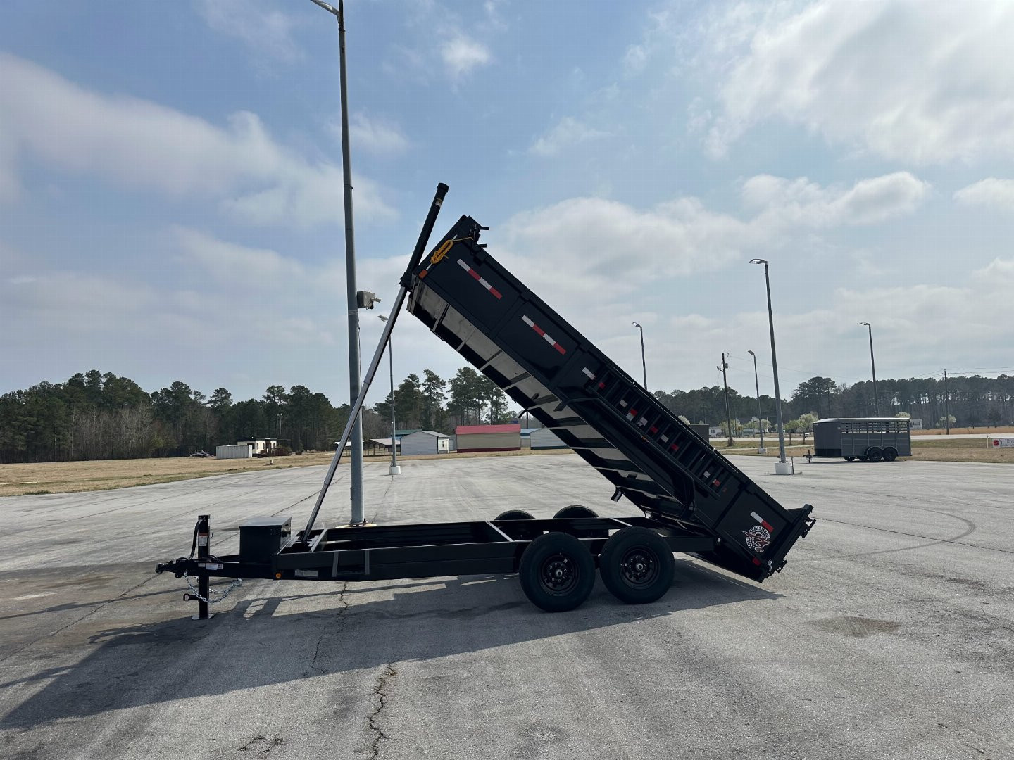 New 2025 Homesteader 716TX Dump Trailer