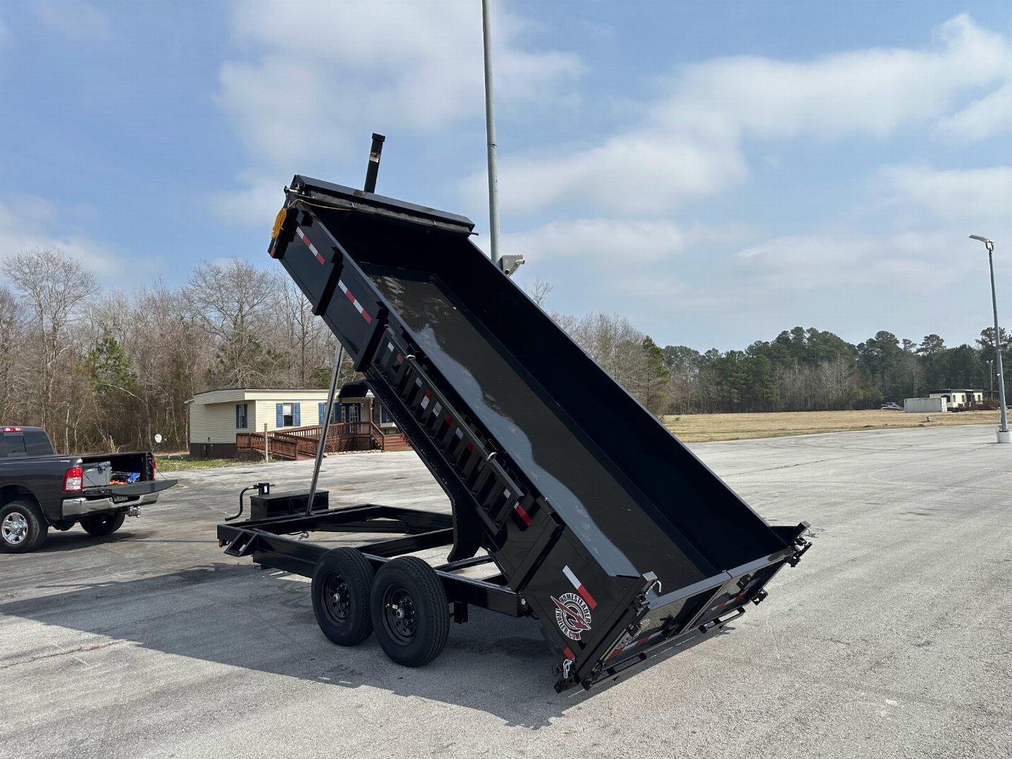 New 2025 Homesteader 716TX Dump Trailer