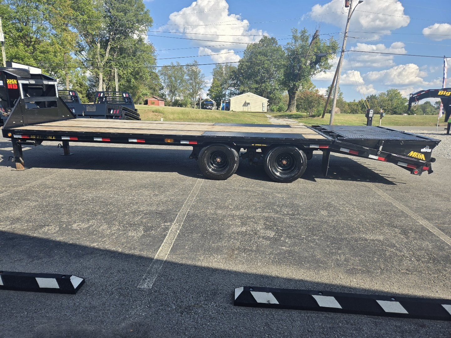 Used USED 2024 Big Tex Trailers 20'+5' Flatbed Trailer W/ Mega Ramps