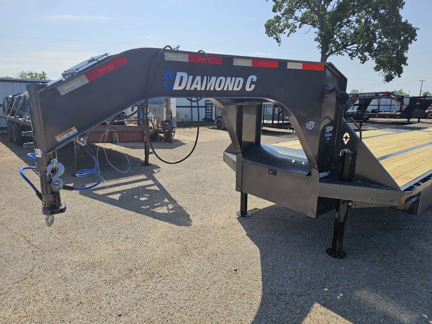 New 2025 Diamond C Trailers FMAX210 102X35HYD Flatbed Trailer