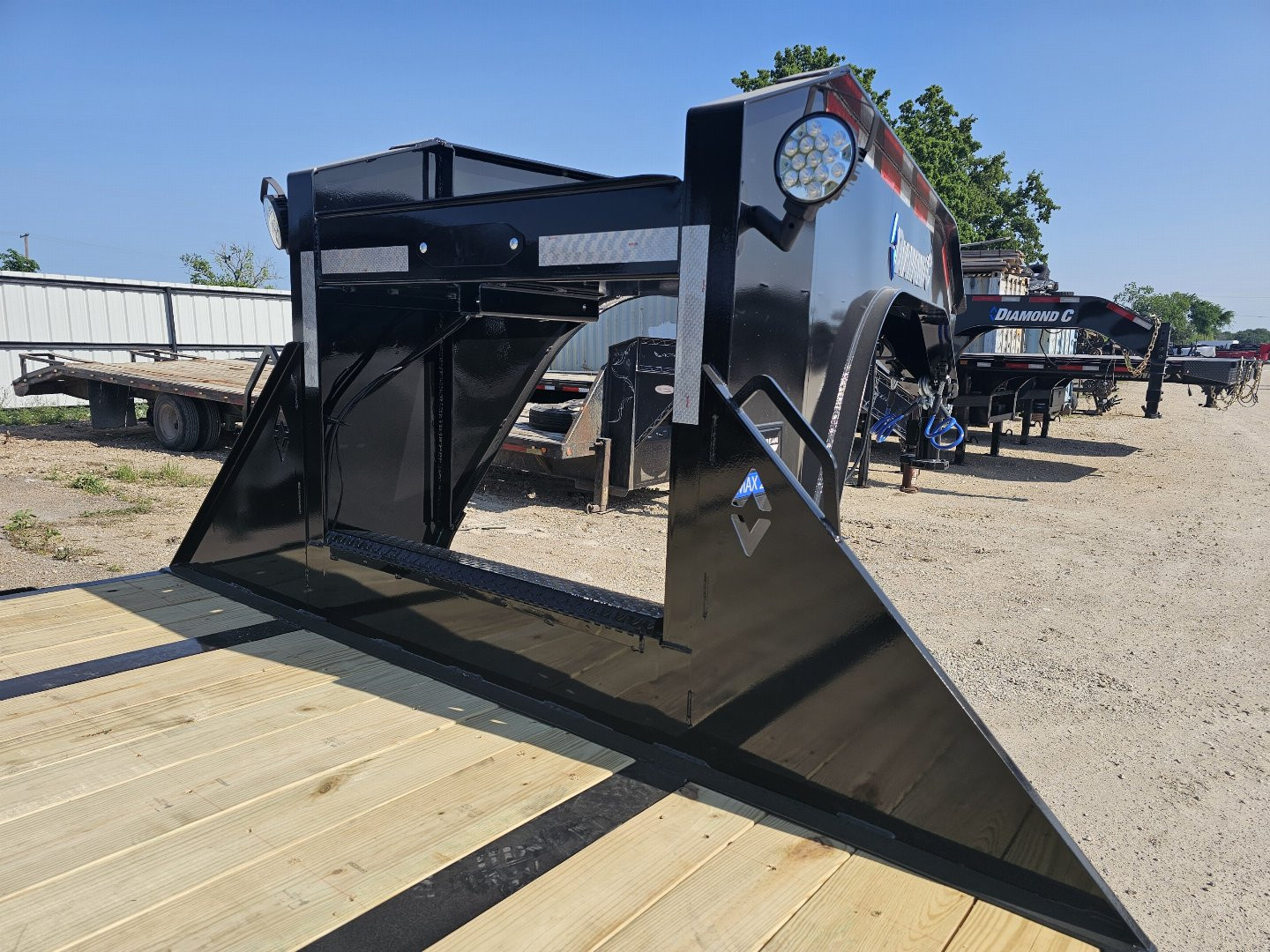 New 2025 Diamond C Trailers FMAX210 30X102 MR Flatbed Trailer