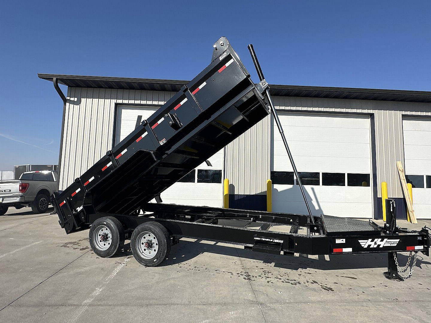New 2025 H&H Black 83"x16' 22k Topline Telescopic I-Beam Dump Trailer