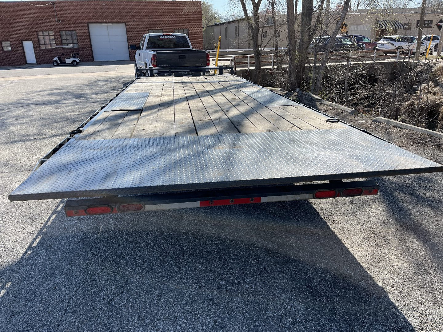 Used 2023 Lamar Trailers 8.5x24 Power Tilt 14k Deckover Trailer