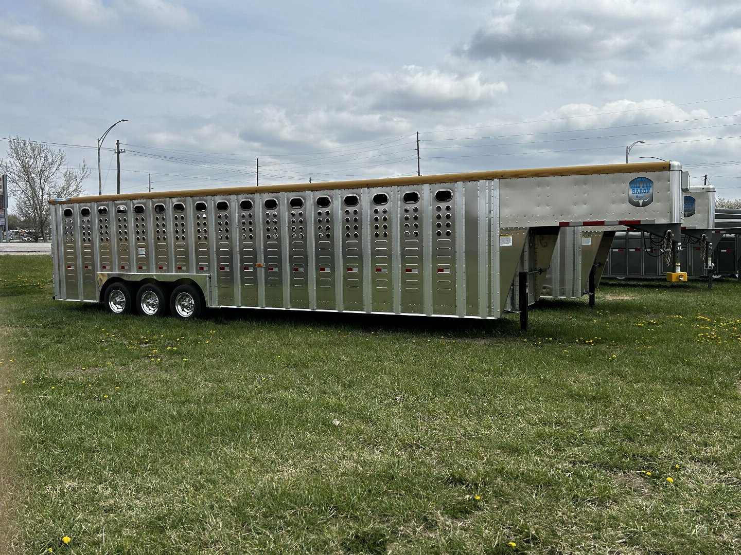 New 2025 Merritt Livestock Stock Trailer 94x32 Triple Axle
