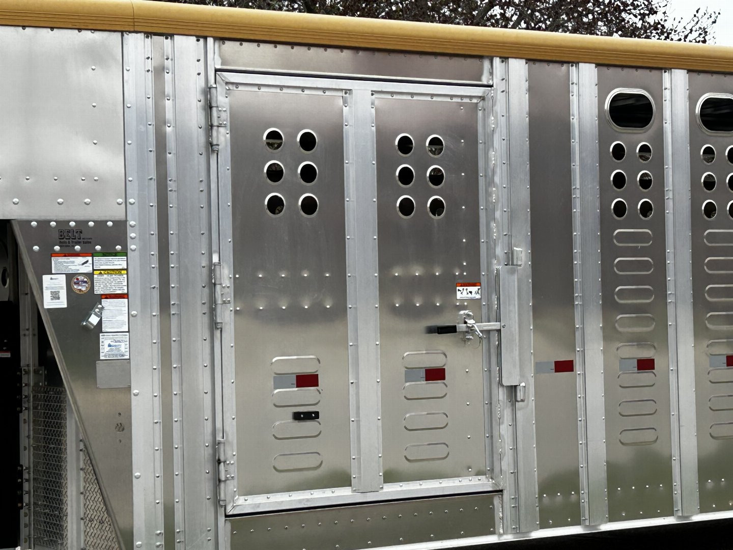 New 2025 Merritt Livestock Stock Trailer 94x32 Triple Axle