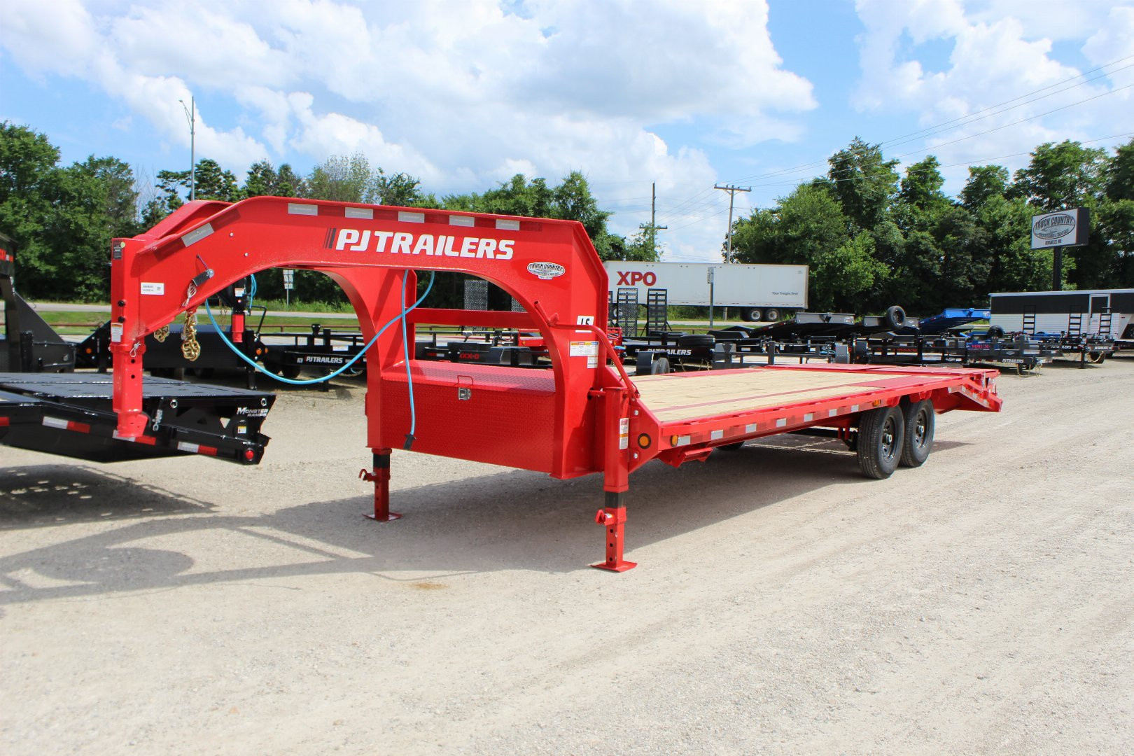 New 2026 PJ TRAILERS 102" x 25' LS Flatbed Trailer