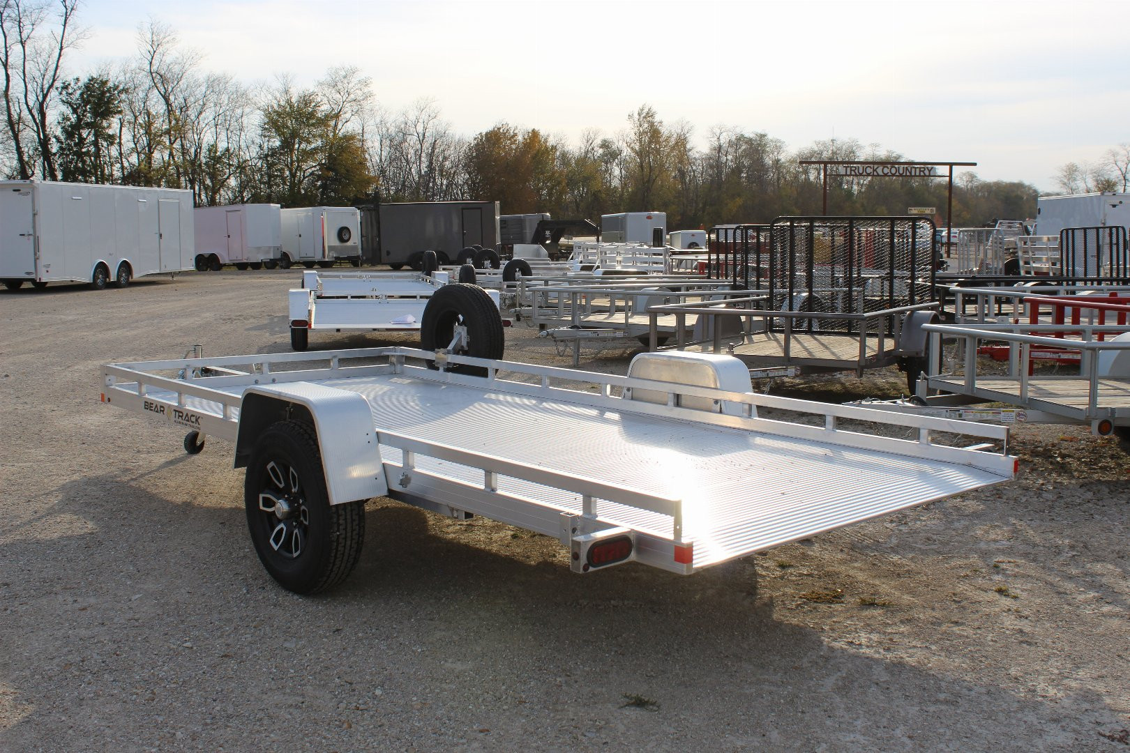 New 2025 Bear Track 15' Tilt Utility Trailer