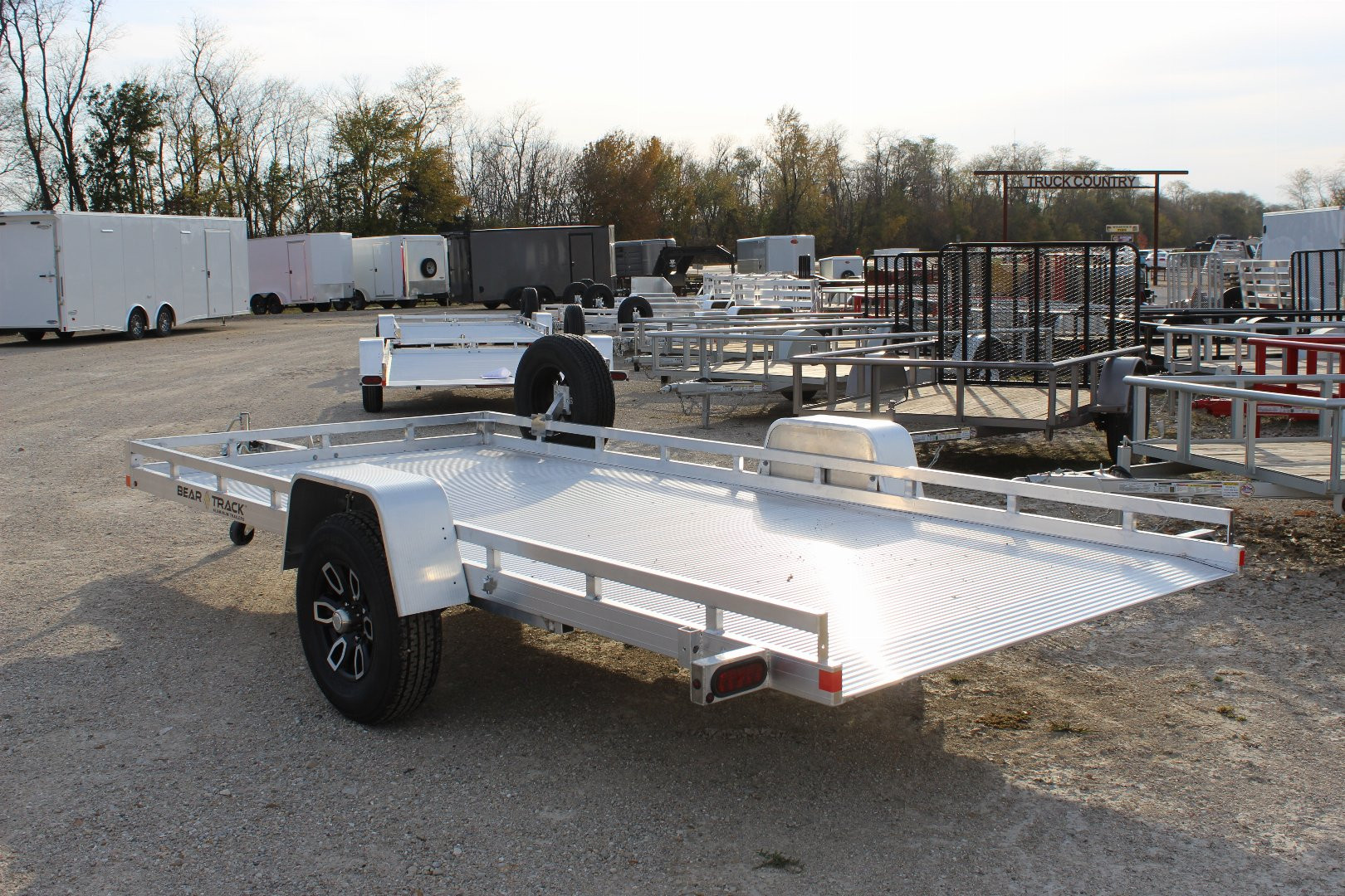 New 2025 Bear Track 15' Tilt Utility Trailer