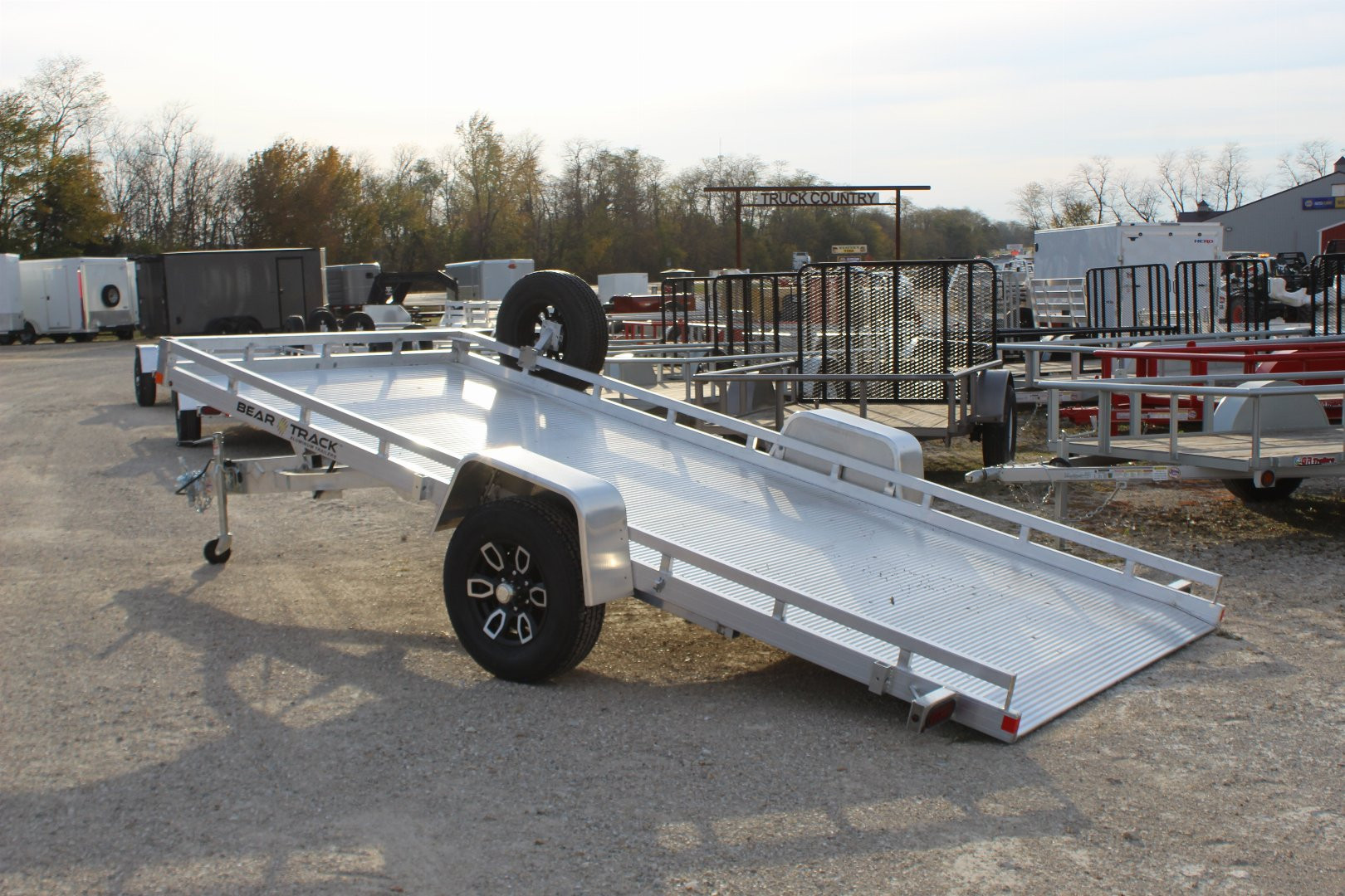 New 2025 Bear Track 15' Tilt Utility Trailer