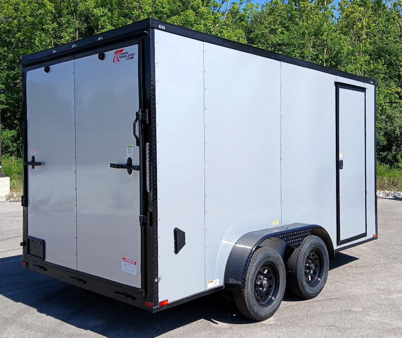 New 7 X 14 Tandem axle enclosed cargo trailer with blackout trim