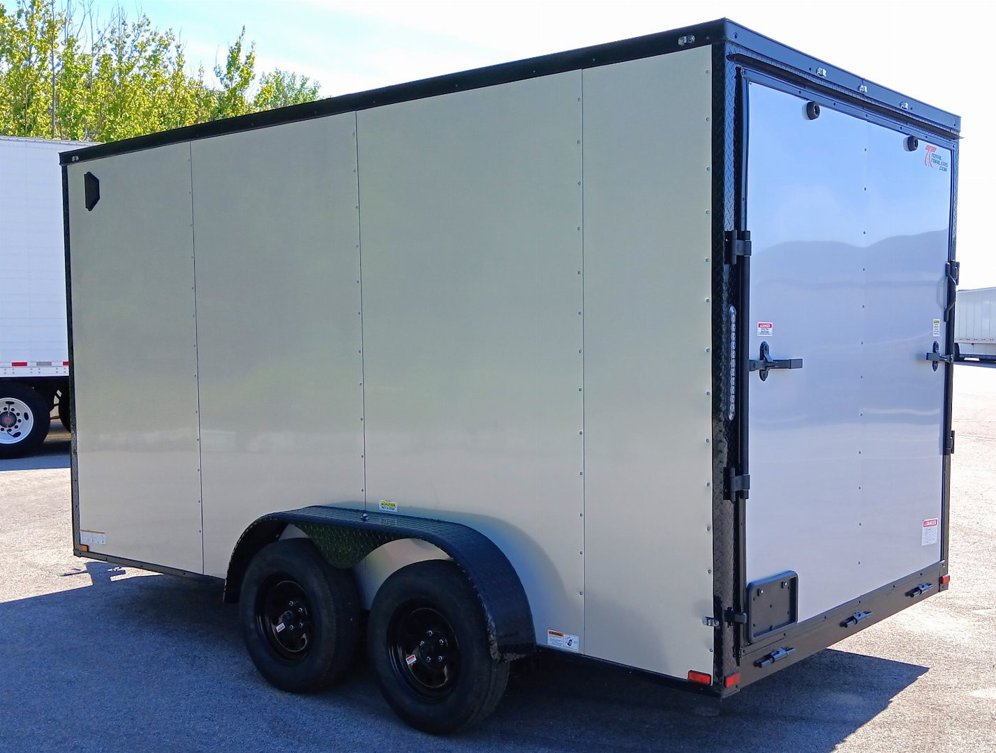 New 7 X 14 Tandem axle enclosed cargo trailer with blackout trim