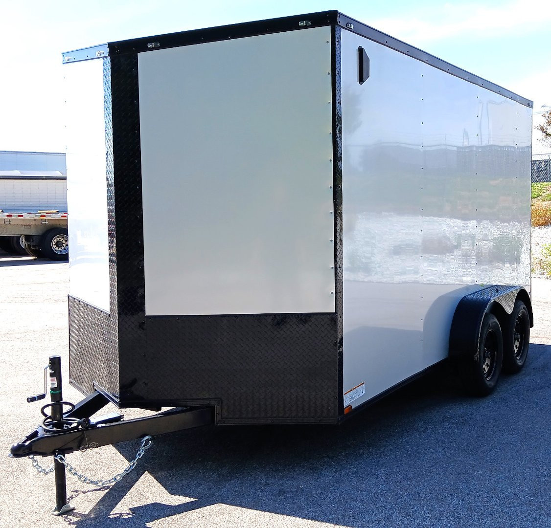 New 7 X 14 Tandem axle enclosed cargo trailer with blackout trim