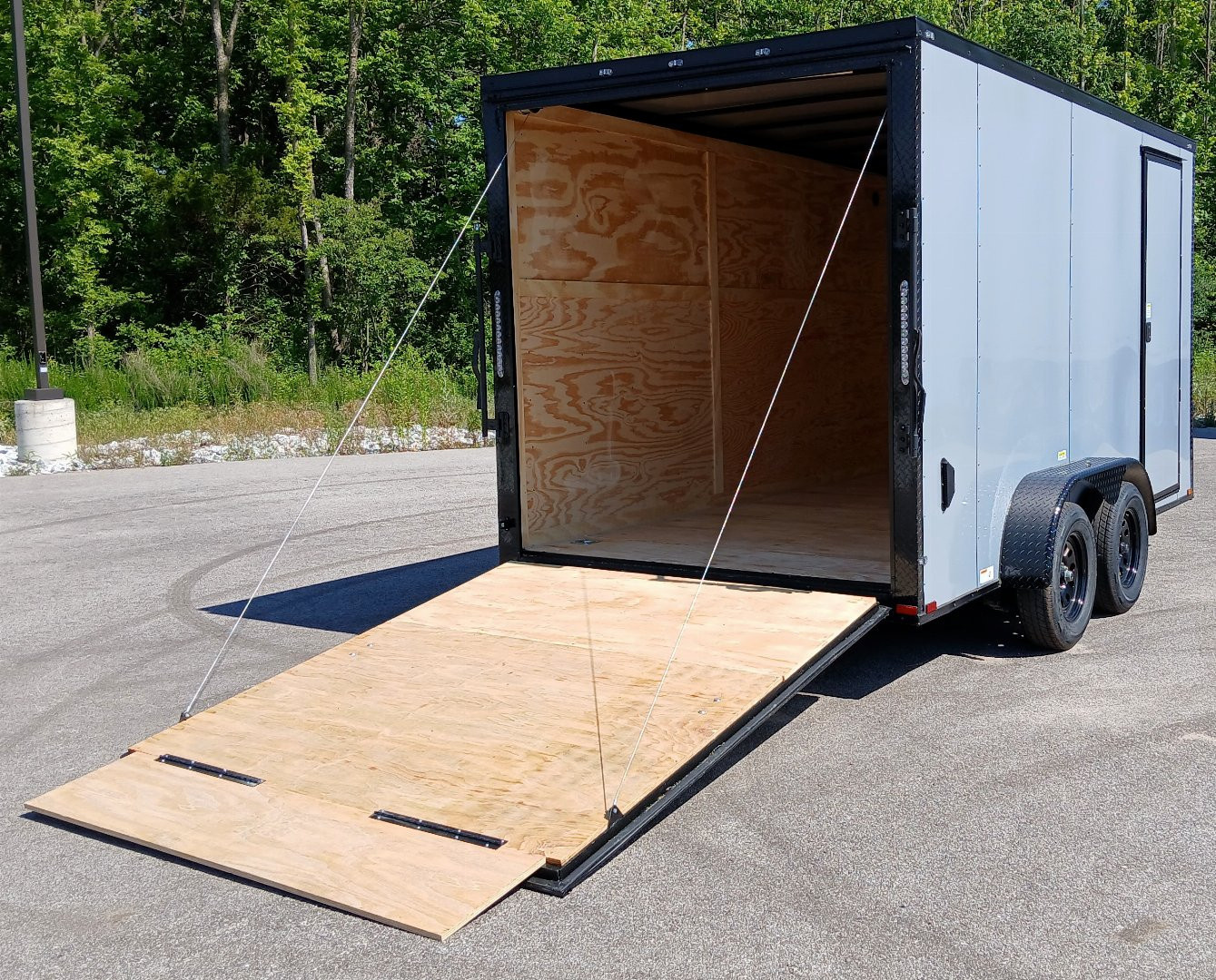 New 7 X 14 Tandem axle enclosed cargo trailer with blackout trim