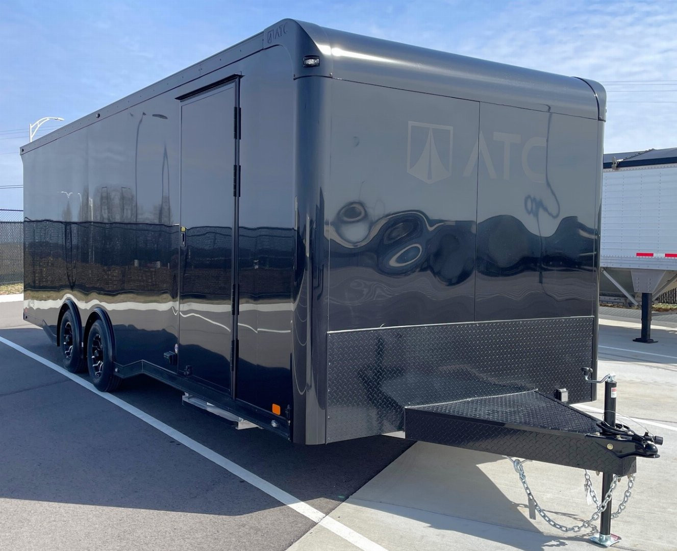 New ATC 8.5 x 24' BLACKOUT Enclosed Car Hauler, 9,990LB, AC, Escape Door, Cabinets, Spare Tire