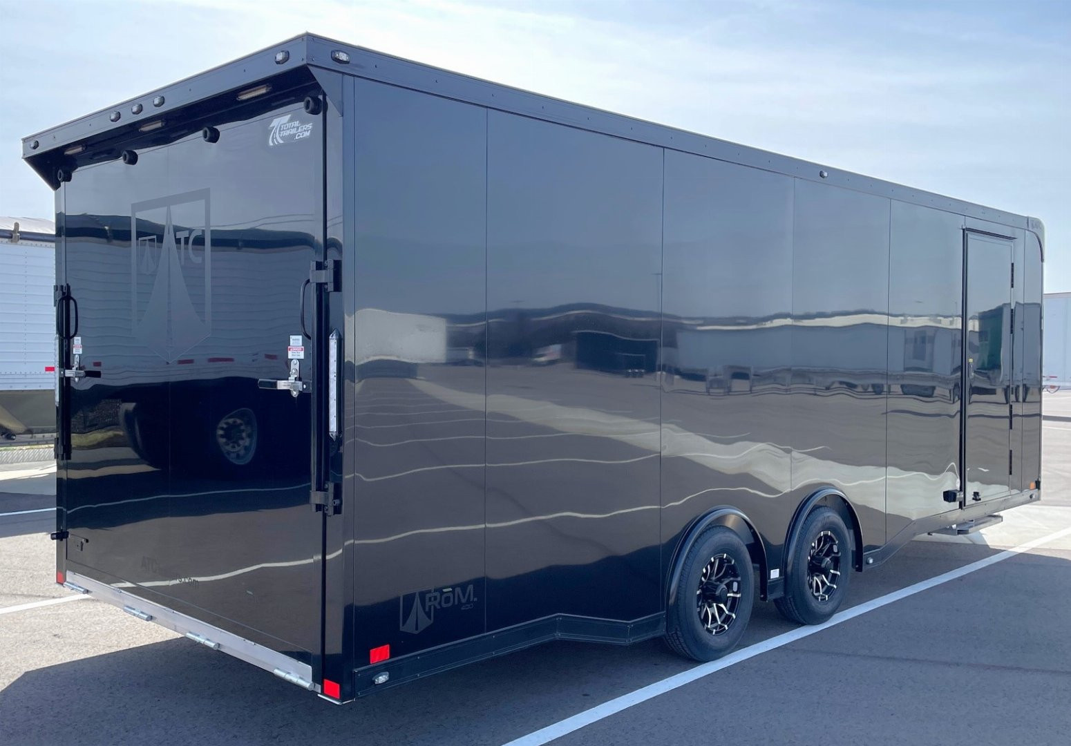New ATC 8.5 x 24' BLACKOUT Enclosed Car Hauler, 9,990LB, AC, Escape Door, Cabinets, Spare Tire