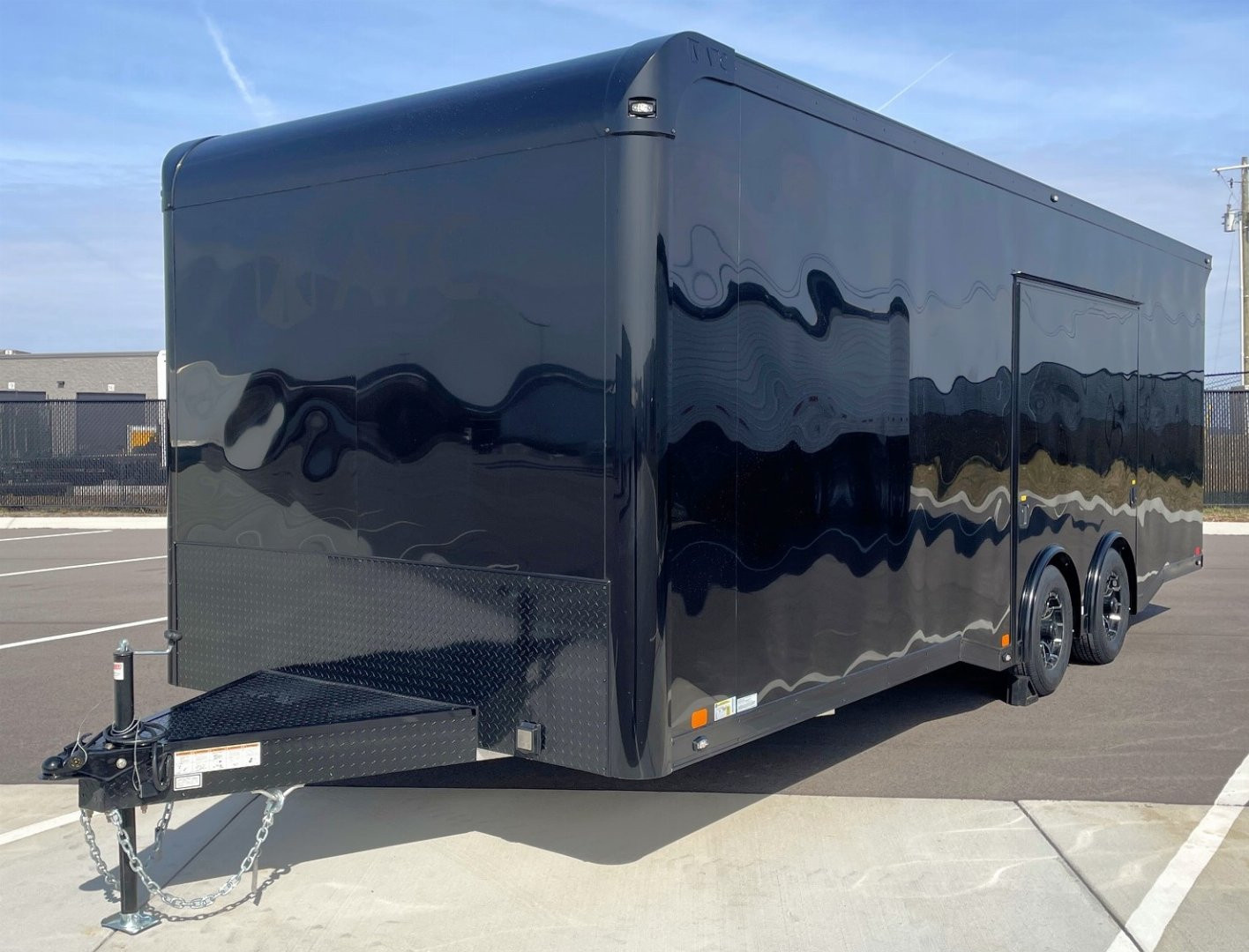 New ATC 8.5 x 24' BLACKOUT Enclosed Car Hauler, 9,990LB, AC, Escape Door, Cabinets, Spare Tire