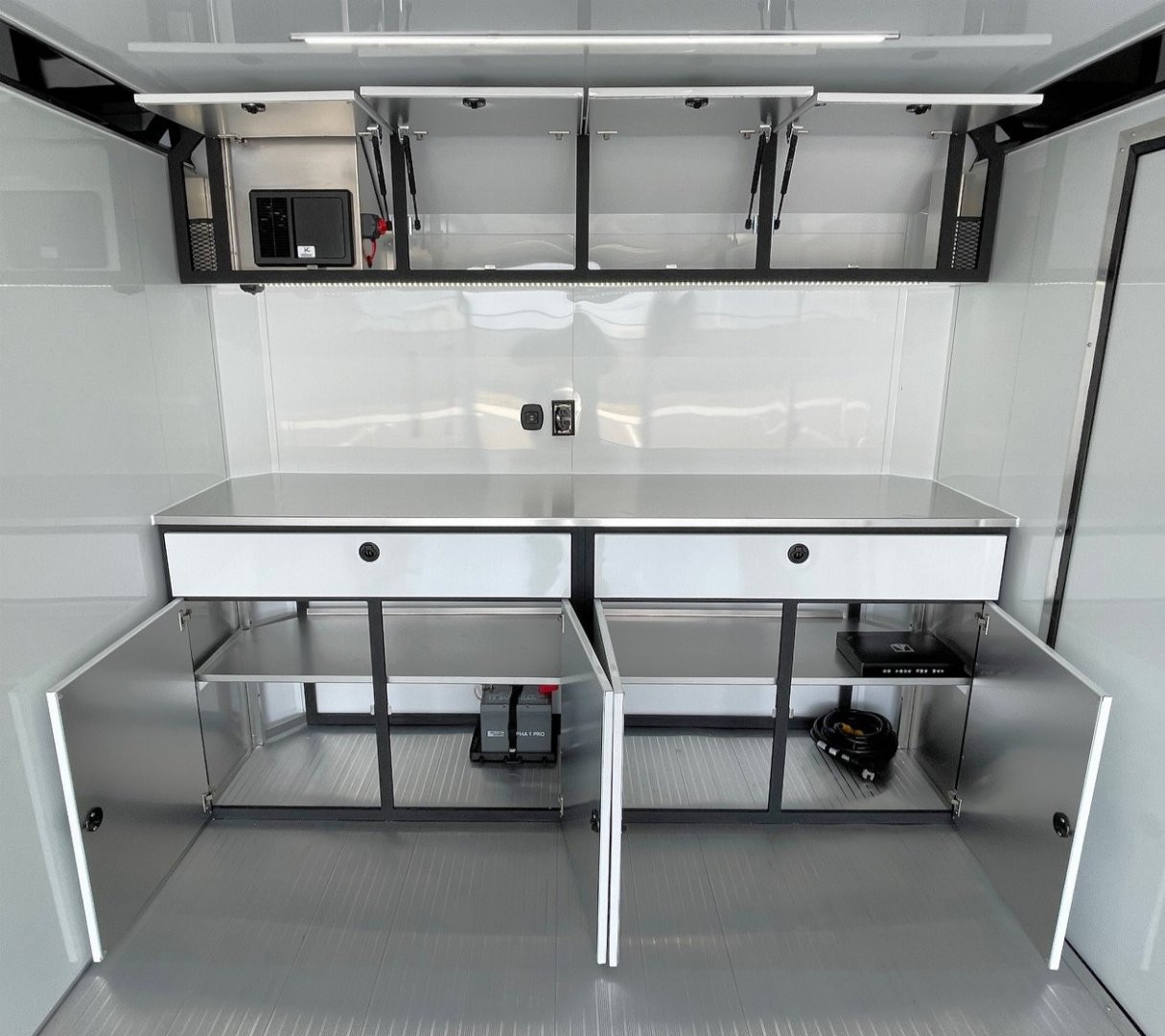 New ATC 8.5 x 24' BLACKOUT Enclosed Car Hauler, 9,990LB, AC, Escape Door, Cabinets, Spare Tire