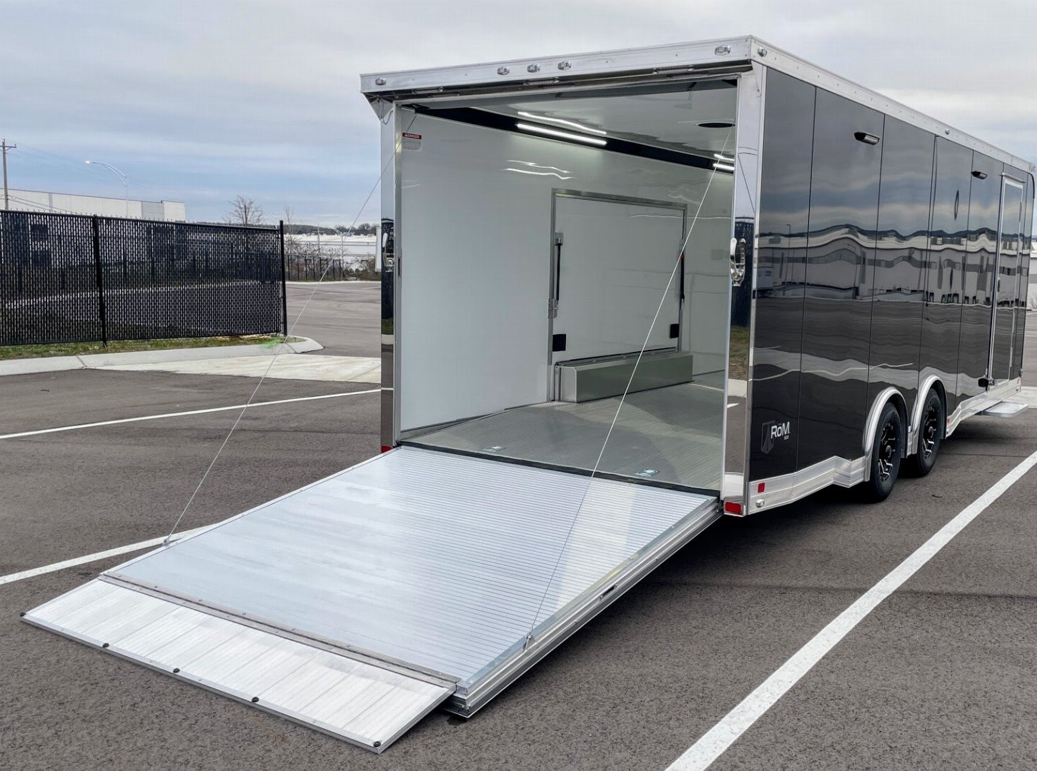 New 2025 ATC Rom 500 8.5' x 24' Aluminum Enclosed Car / Racing Trailer--AC, Spare, 50 Amp