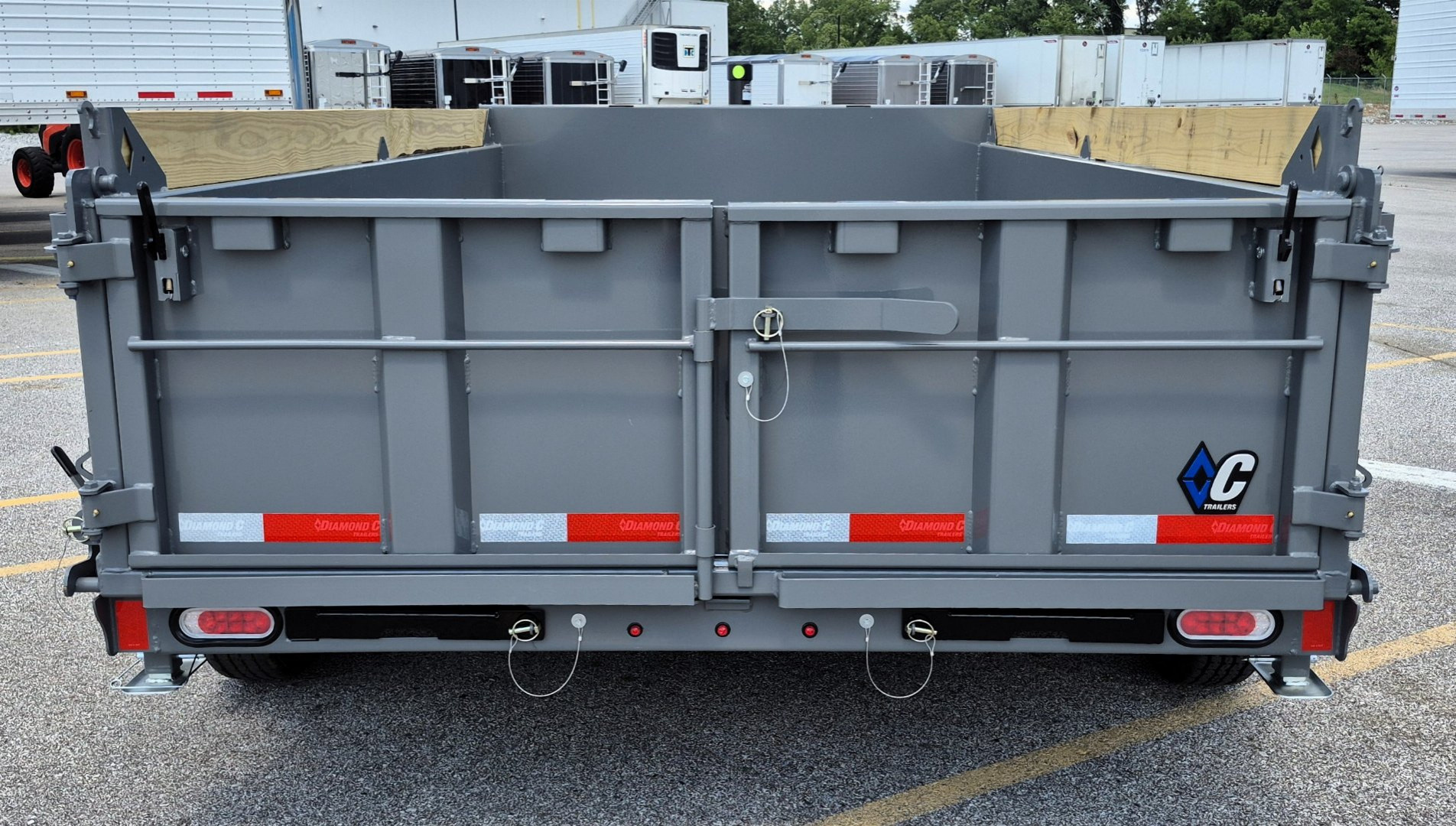 New Diamond C 6.5' x 12' Dump Trailer 9,890LB, 24" Sides, Spare Tire