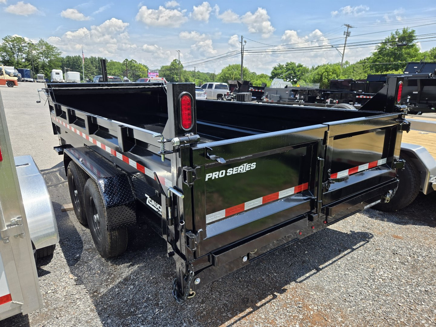 New 7 x 16 Sure-Trac *PRO SERIES* Telescopic Dump Trailer, 15.4k GVWR ** 7 ga. Floor, Ext. Tongue, Tarp, Stab. Jacks, Batt Charger, Pintle Ring
