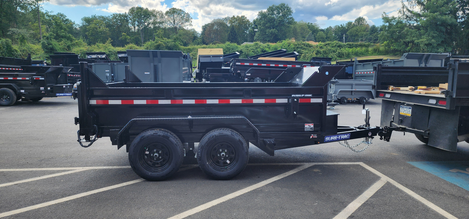 New 6 x 10 Sure-Trac Low-Pro Single Ram Dump Trailer 7k **w/Ramps & Stab Jacks