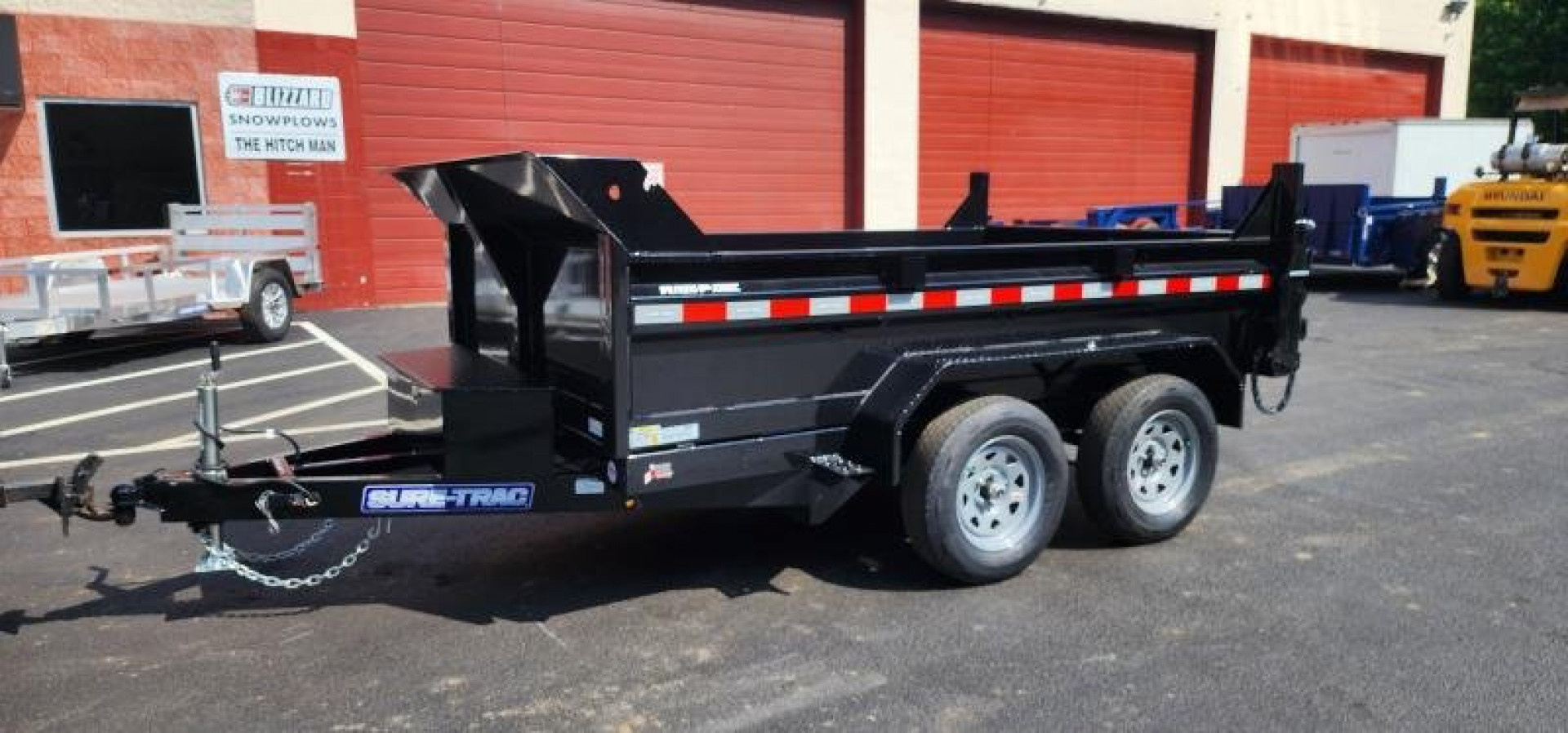 New 6 x 10 Sure-Trac Low-Pro Single Ram Dump Trailer 7k **w/Ramps & Stab Jacks