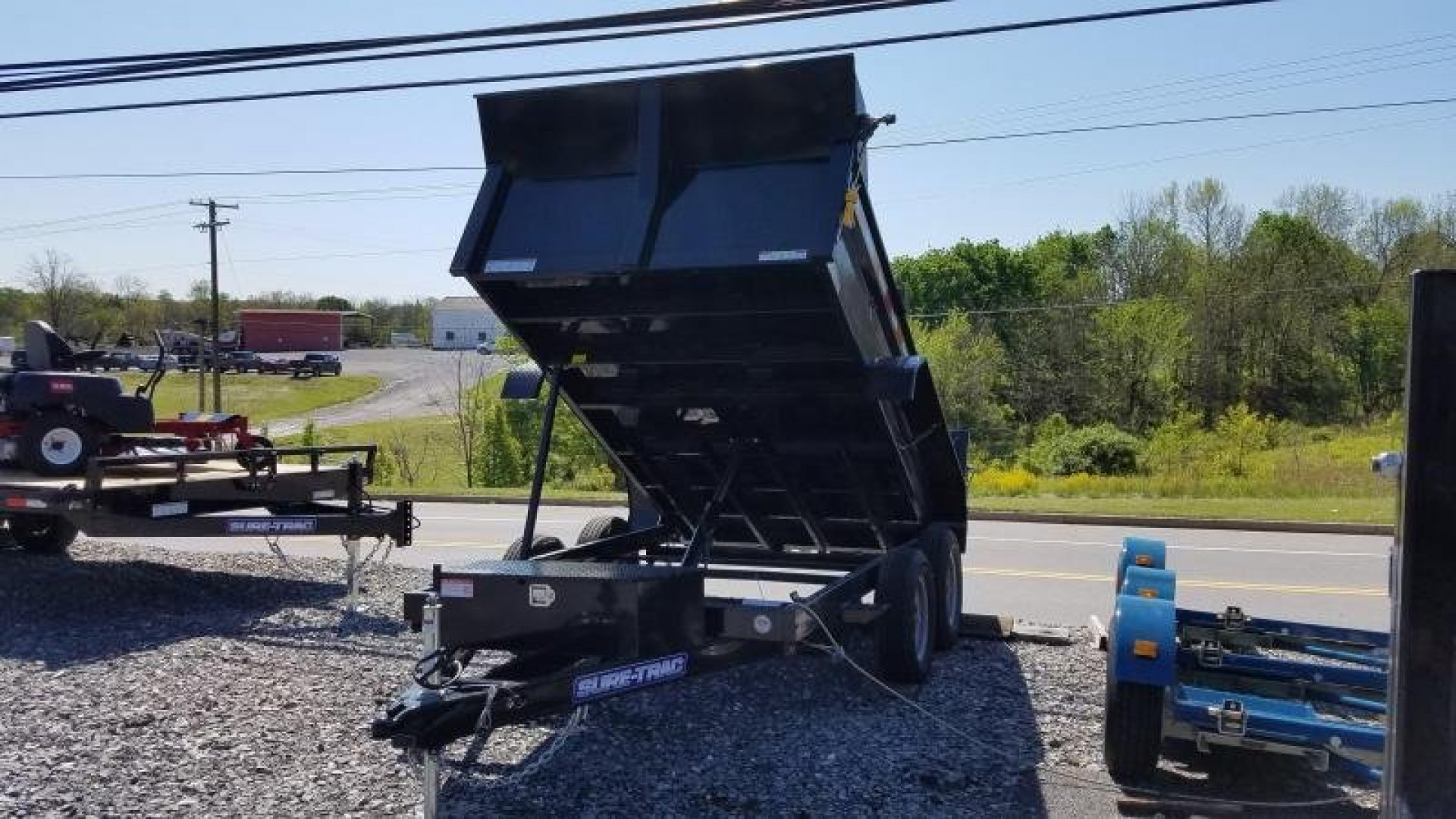 New 6 x 10 Sure Trac Low Profile Single Ram Dump, 7K GVWR  ***Ramps Underneath, Dual Acting Tailgate, Power Up/Down Hyd.